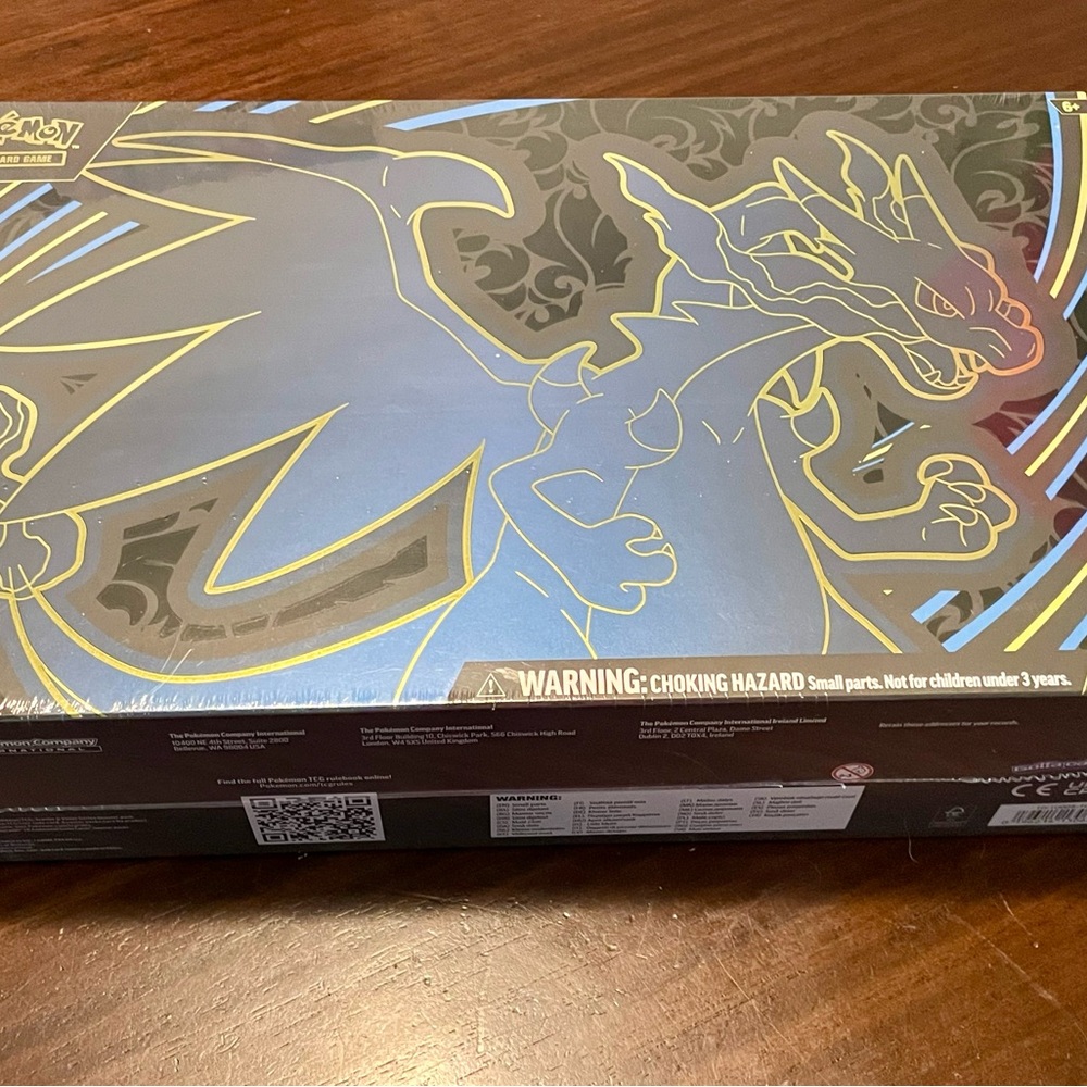 Last one..

New Pokémon TCG Mega Charizard X ex Ultra-Premium Collection